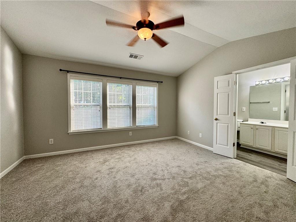3980 Howell Park Road Duluth, GA 30096 - Photo 21 of 34 a view of an empty room with a window