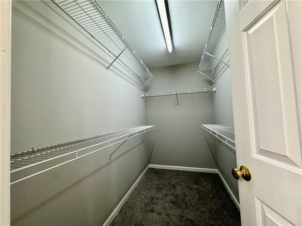 3980 Howell Park Road Duluth, GA 30096 - Photo 25 of 34 a storage room with a washer and dryer