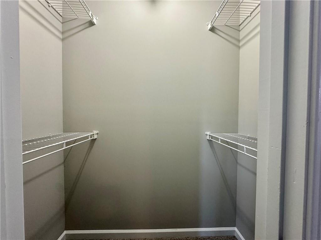 3980 Howell Park Road Duluth, GA 30096 - Photo 26 of 34 a view of a room with racks on the wall