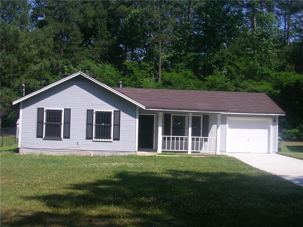 686 Alex Way Southwest Atlanta, GA 30331 - Photo 1 of 1 a front view of a house with a yard