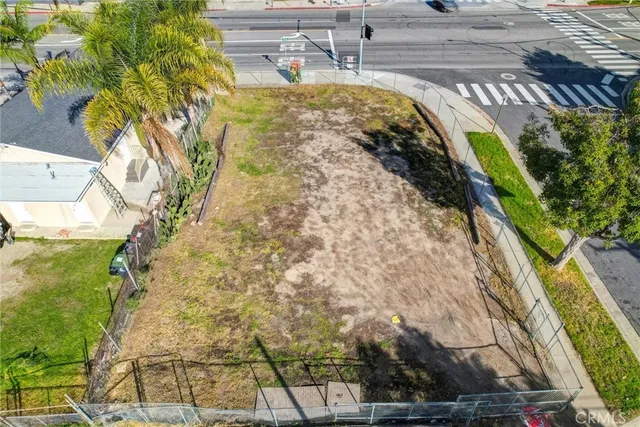a view of a swimming pool with a yard
