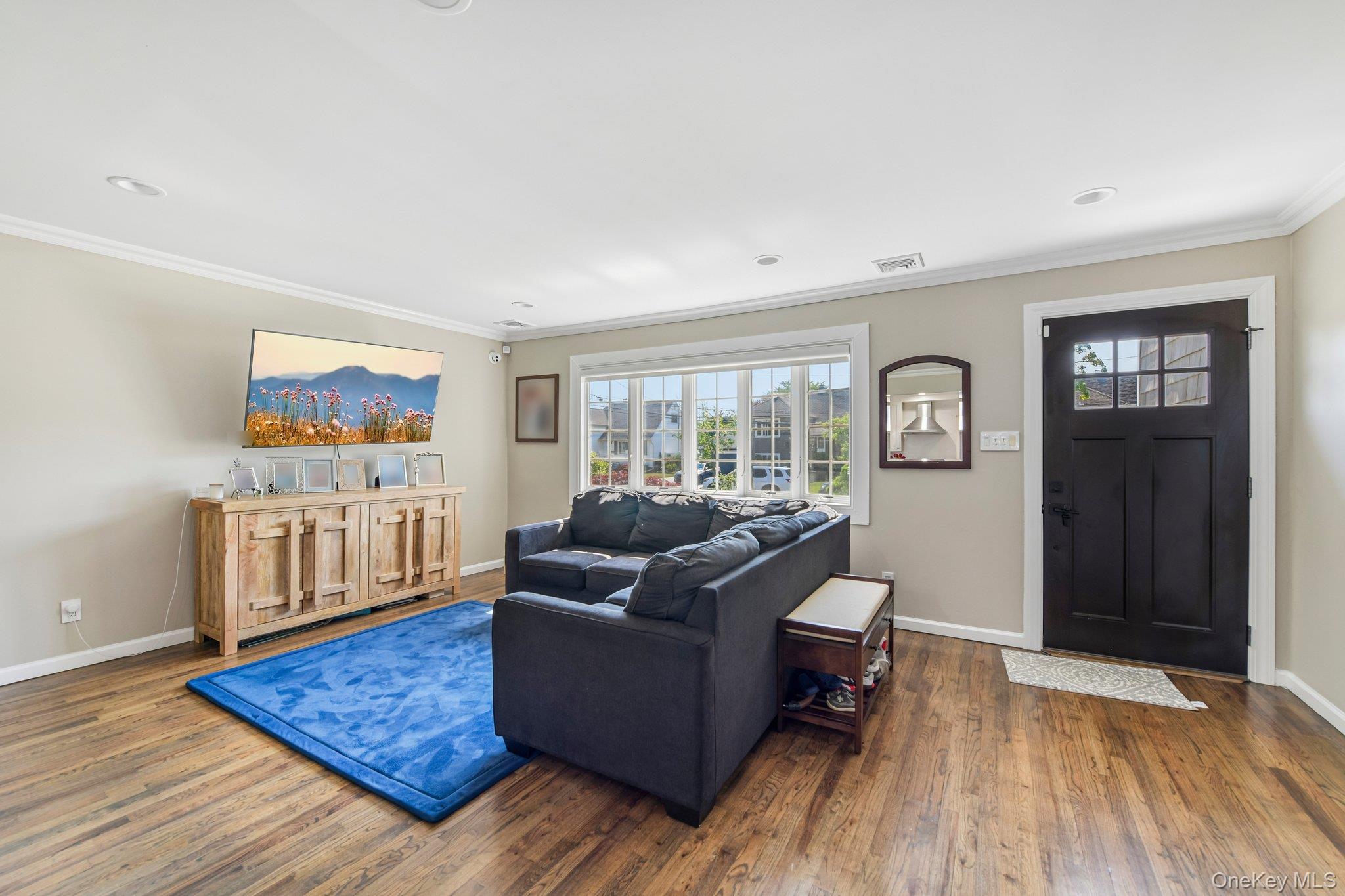 2821 Colonial Avenue Merrick, NY 11566 - Photo 4 of 29 a living room with furniture and a window