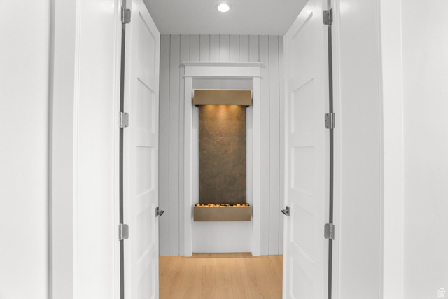 1354 South 800 East Mapleton, UT 84664 - Photo 33 of 129 Hallway with light wood-type flooring and wood walls