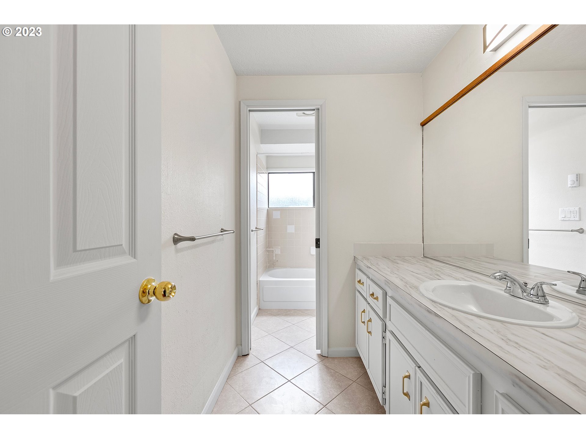 736 Edgemont Way Springfield, OR 97477 - Photo 24 of 44 a bathroom with a sink and a mirror