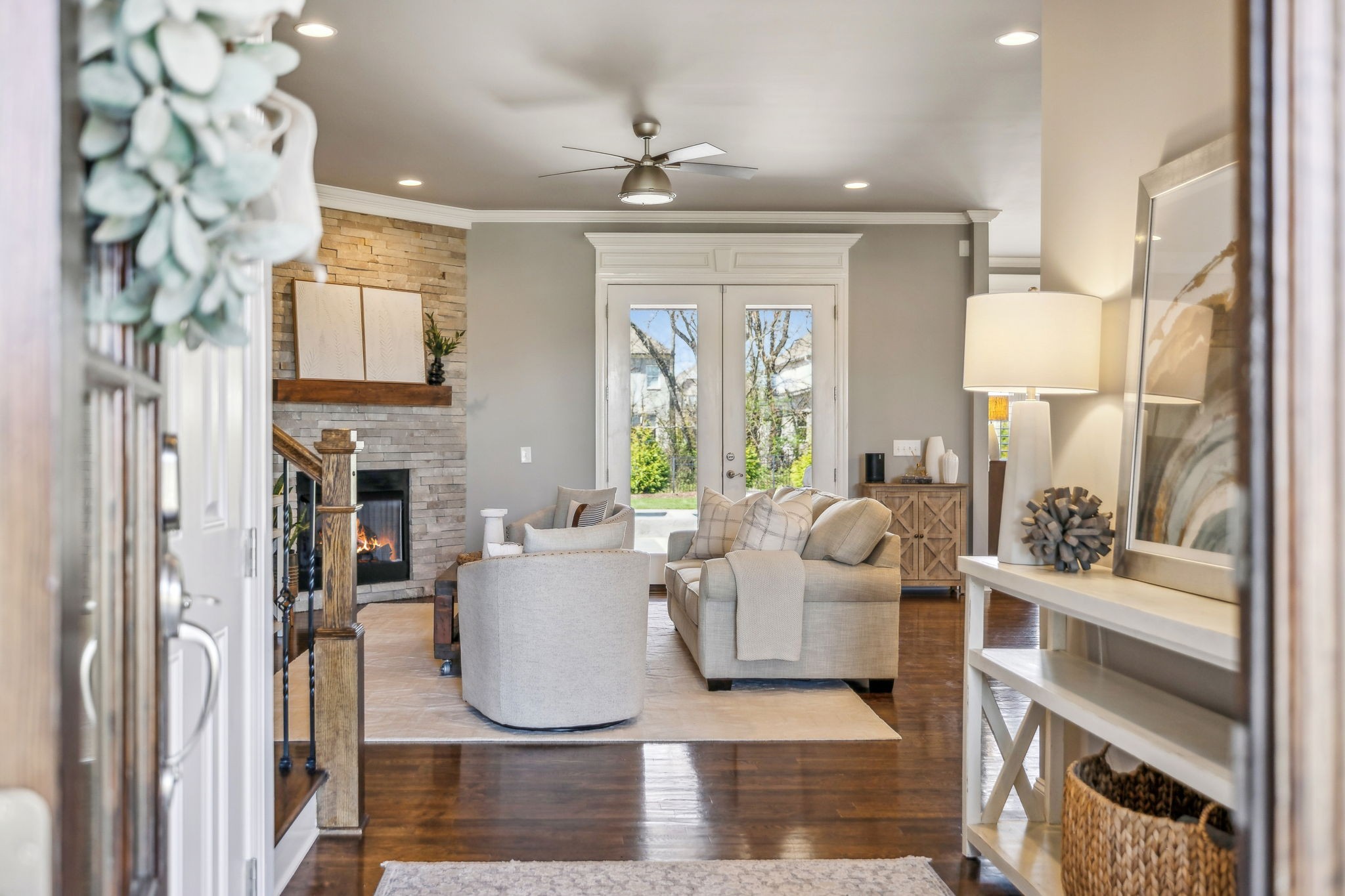 2772 Cabin Run Bridge Road Thompson's Station, TN 37179 - Photo 17 of 98 a living room with fireplace furniture and a large window