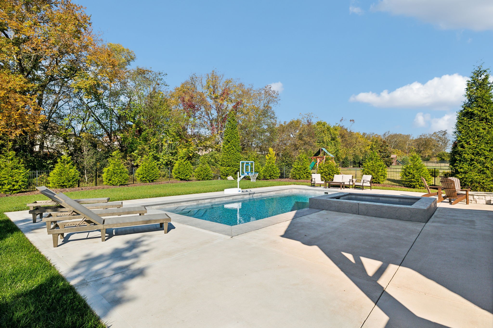 2772 Cabin Run Bridge Road Thompson's Station, TN 37179 - Photo 33 of 98 a view of a swimming pool with a patio