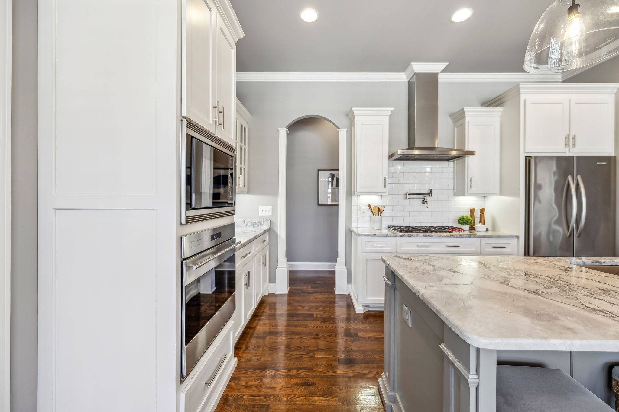 2772 Cabin Run Bridge Road Thompson's Station, TN 37179 - Photo 57 of 98 a kitchen with stainless steel appliances granite countertop a refrigerator and a stove top oven
