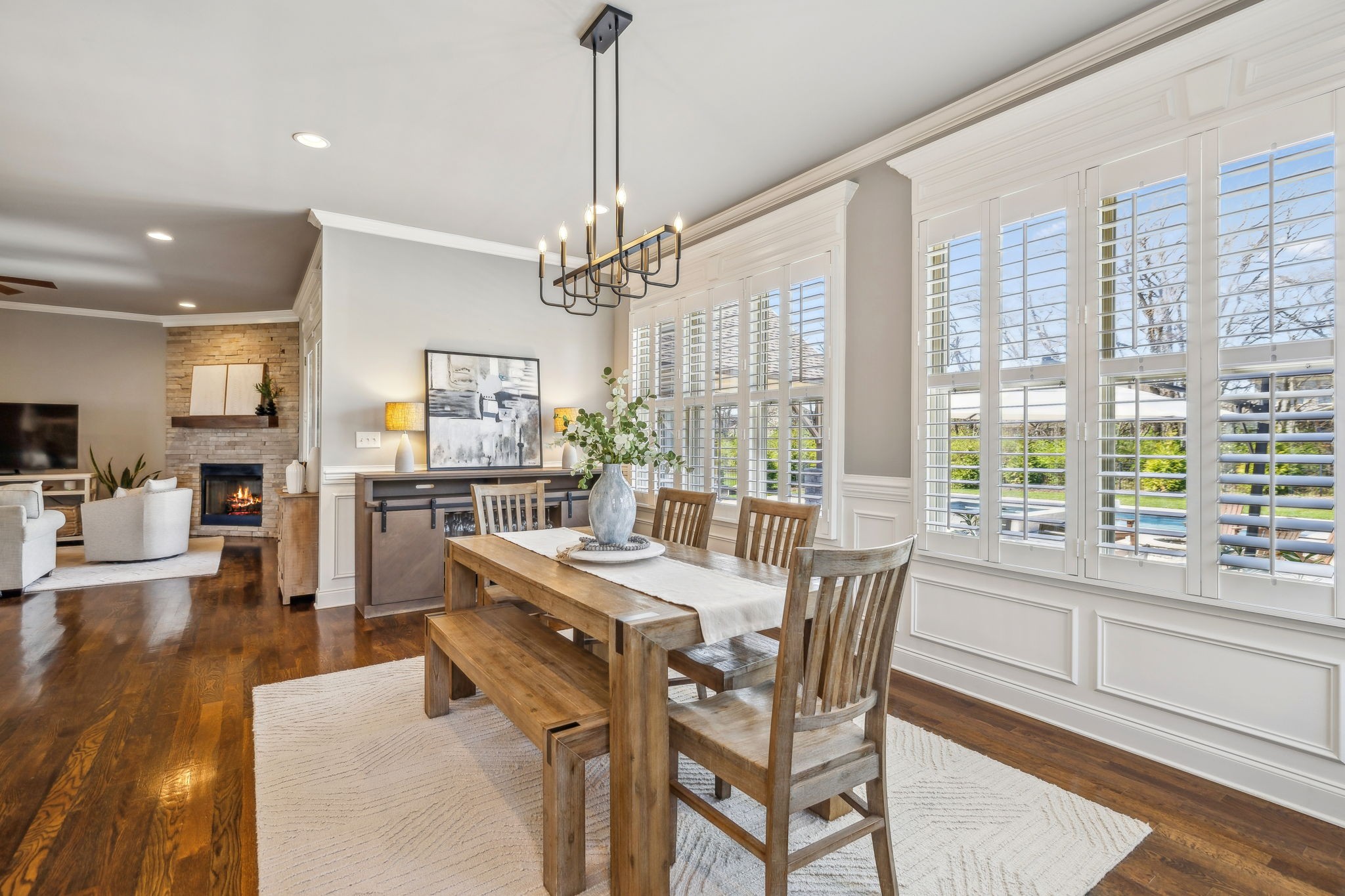 2772 Cabin Run Bridge Road Thompson's Station, TN 37179 - Photo 67 of 98 a view of a dining room and livingroom with furniture wooden floor a chandelier