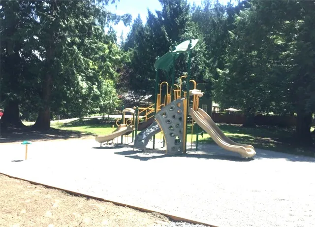 a view of swimming pool patio and fire pit