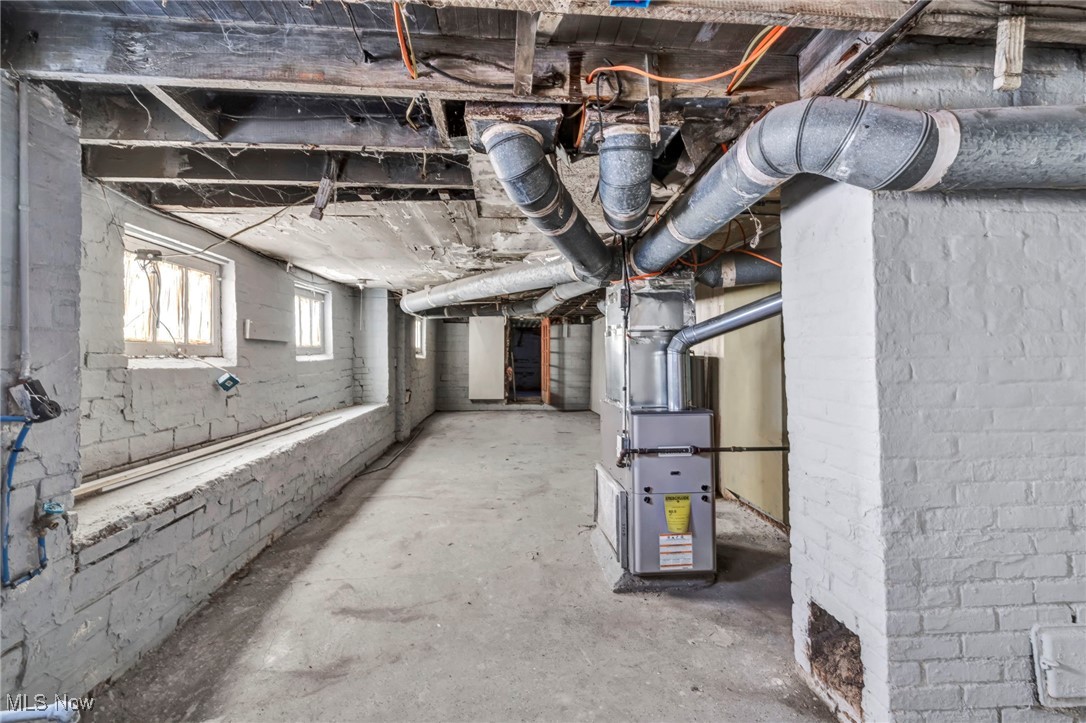 10112 Kinsman Road Cleveland, OH 44104 - Photo 48 of 49 Basement with heating unit