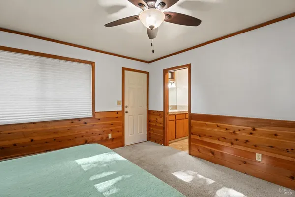 a room with furniture and chandelier