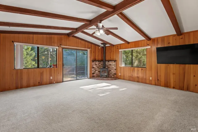 a view of a room with a flat screen tv