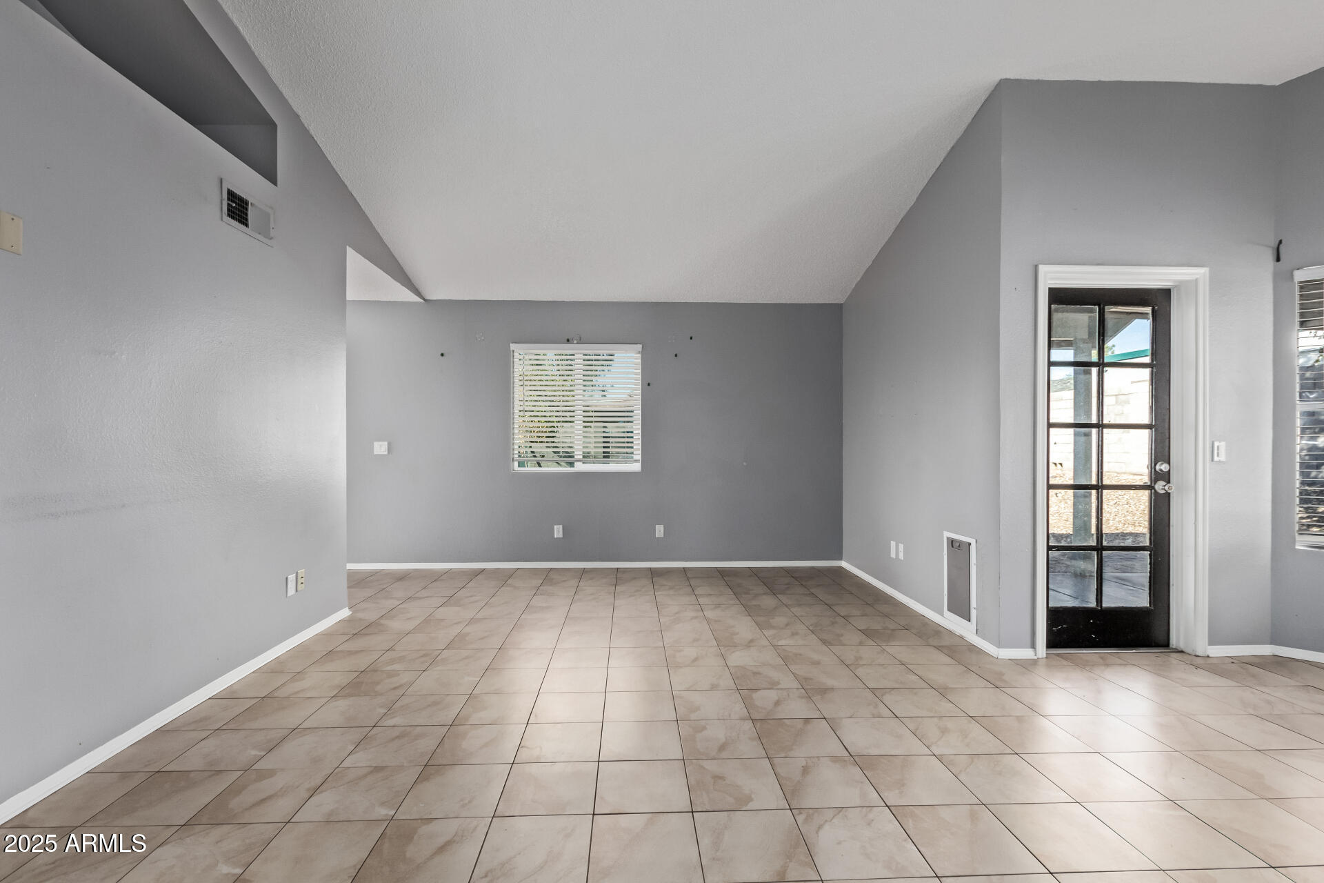 9266 East Quarterline Road Mesa, AZ 85207 - Photo 9 of 31 an empty room with windows