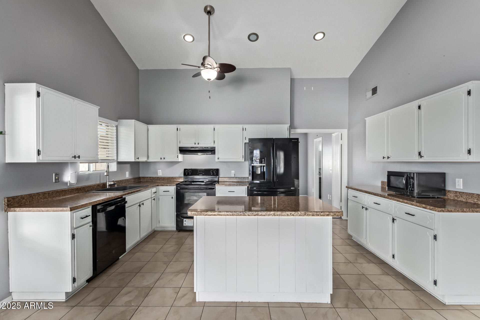 9266 East Quarterline Road Mesa, AZ 85207 - Photo 13 of 31 a large kitchen with cabinets