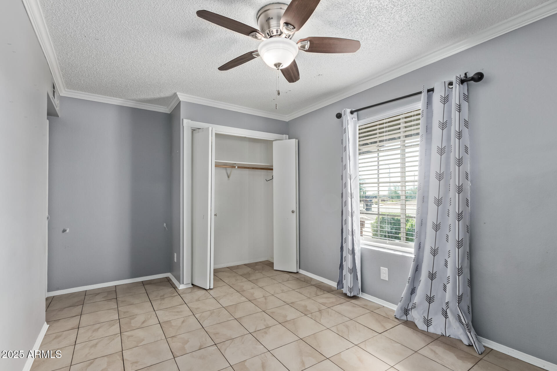 9266 East Quarterline Road Mesa, AZ 85207 - Photo 22 of 31 a view of an empty room with a window
