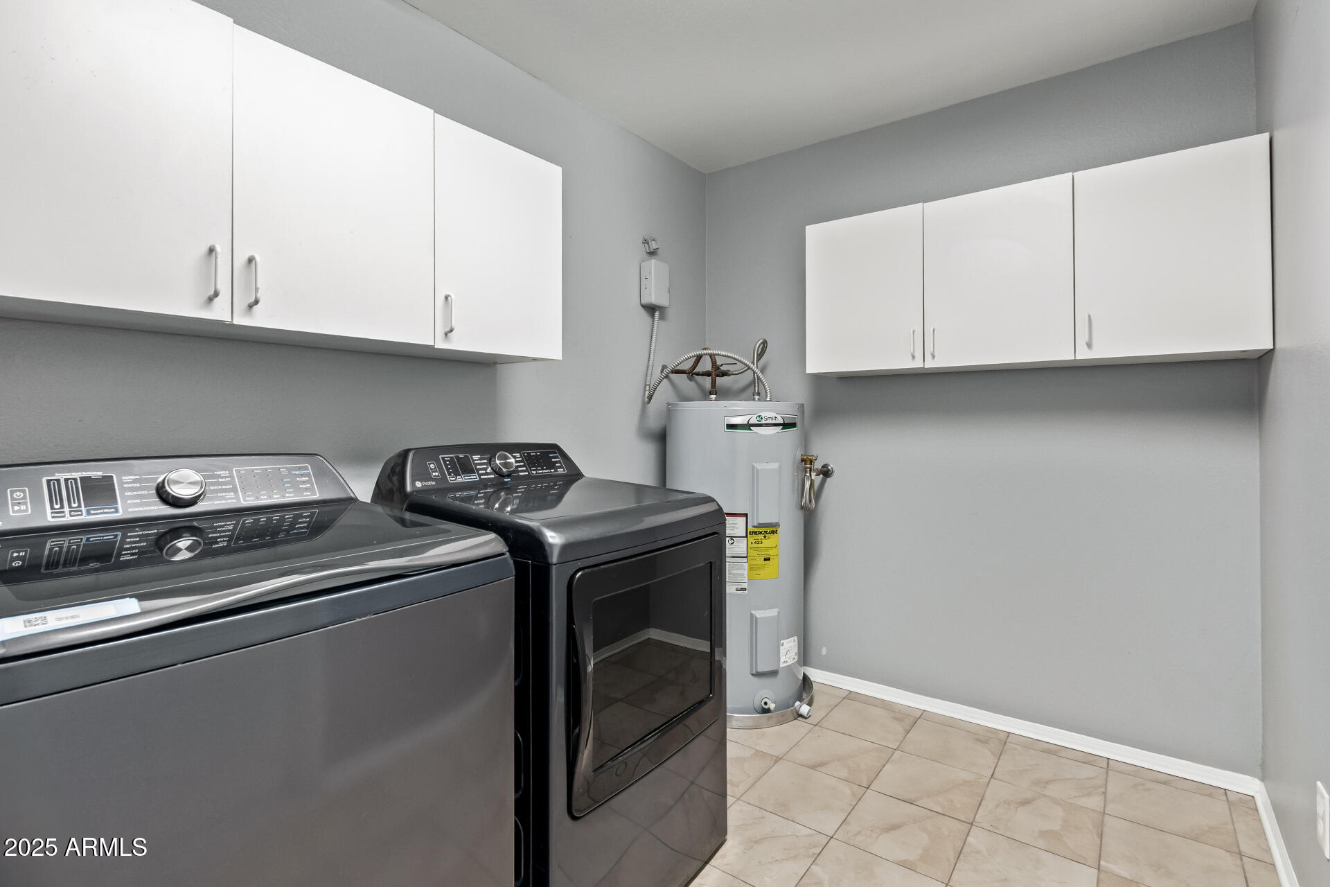 9266 East Quarterline Road Mesa, AZ 85207 - Photo 25 of 31 a utility room with dryer and washer