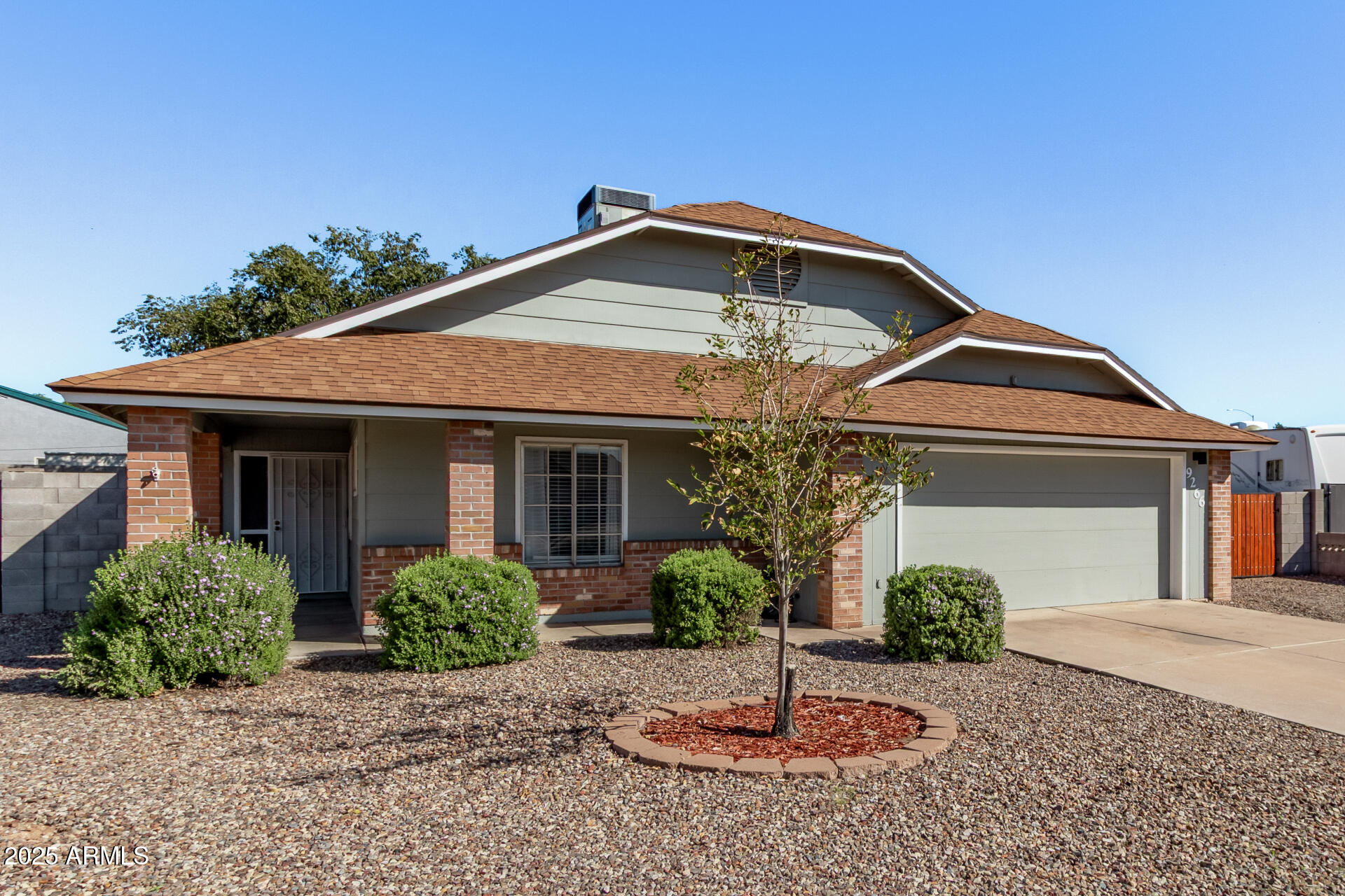 9266 East Quarterline Road Mesa, AZ 85207 - Photo 3 of 31 a front view of a house with a yard
