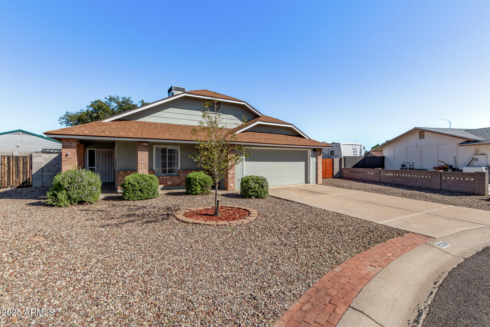 9266 East Quarterline Road Mesa, AZ 85207 - Photo 4 of 31 a front view of a house with yard and seating