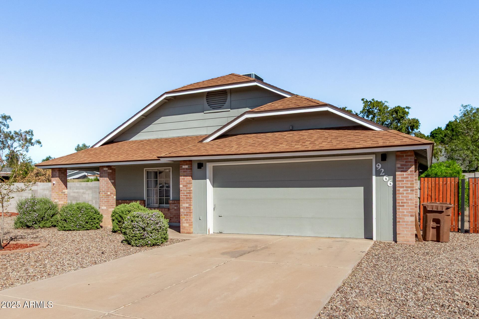 9266 East Quarterline Road Mesa, AZ 85207 - Photo 5 of 31 a front view of a house with a garage
