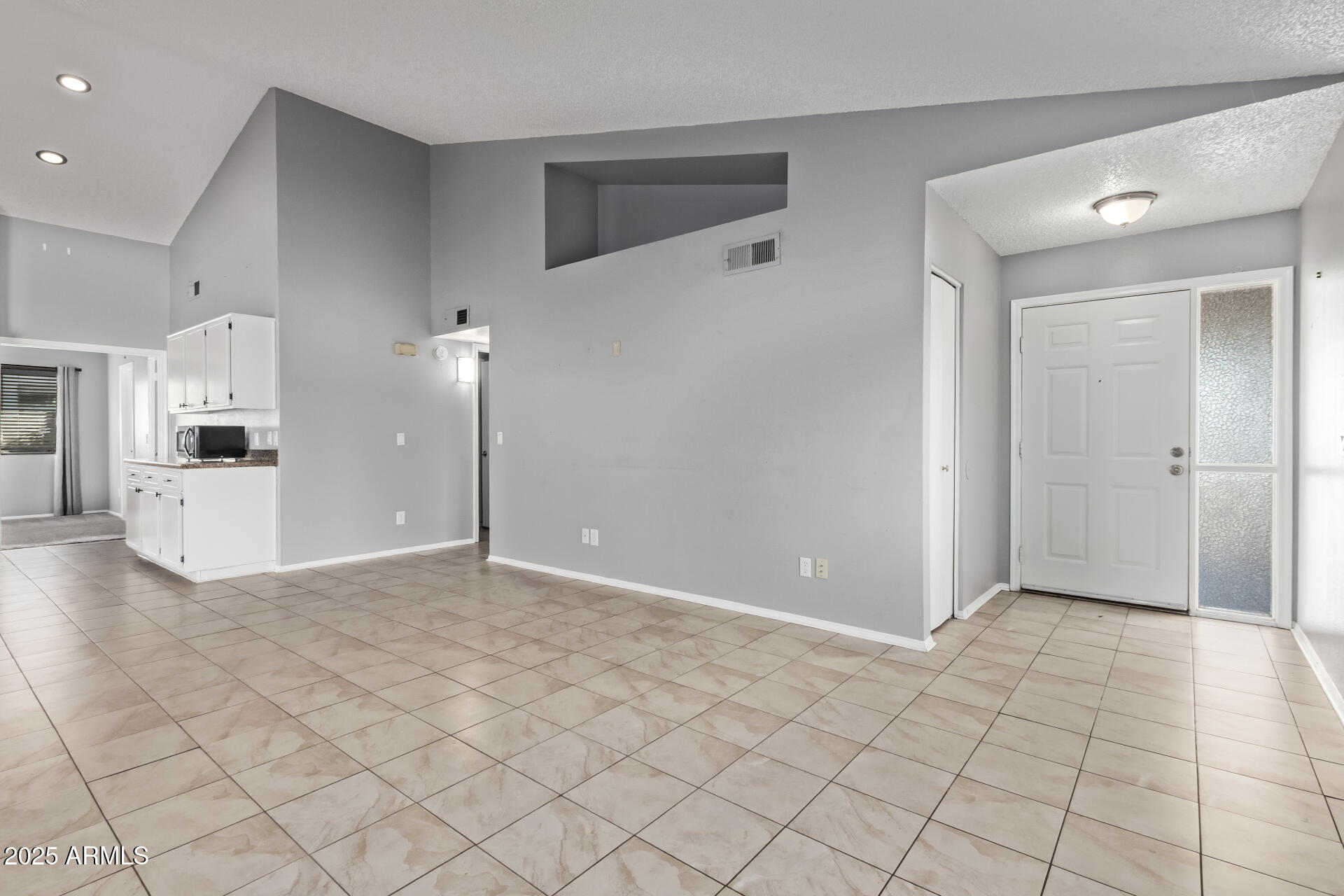 9266 East Quarterline Road Mesa, AZ 85207 - Photo 7 of 31 a view of a big room with closet and windows