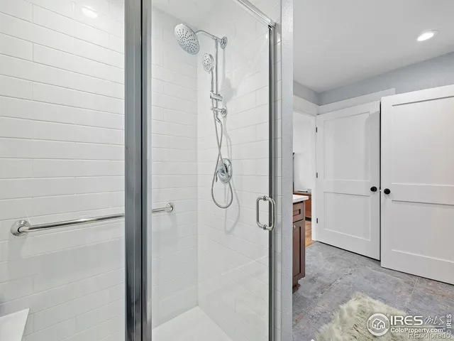 a view of a patio with lawn chairs wooden floor and next to a yard