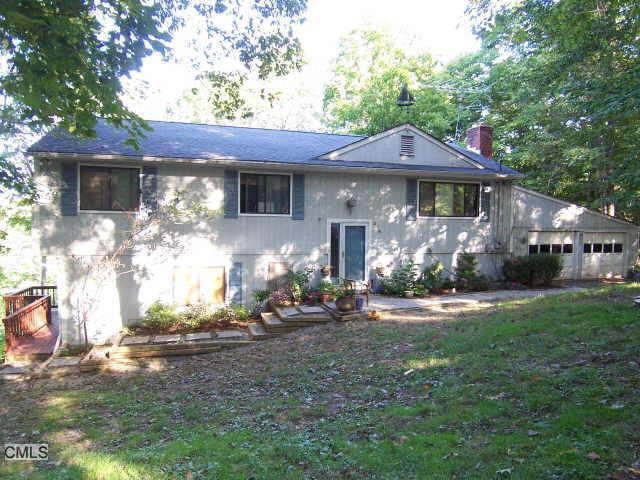 276 Old Sib Road Ridgefield, CT 06877 - Photo 1 of 1 a front view of a house with yard