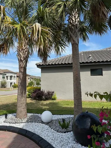 a kitchen with white cabinets and a stove