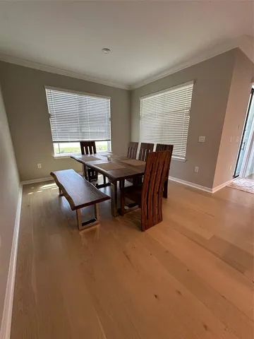 a spacious bathroom with a tub shower and sink