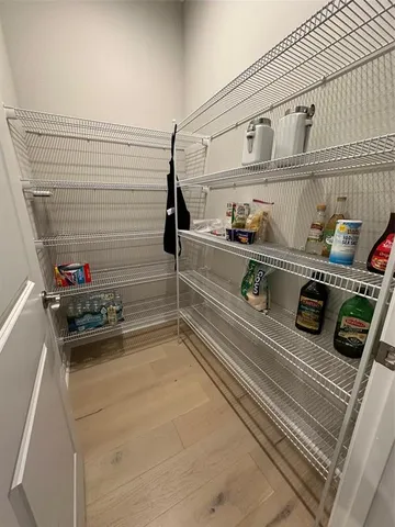 a bathroom with a tub and shower