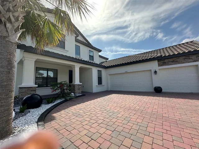 a backyard of a house with seating space