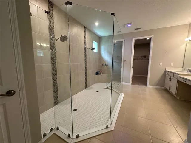 a view of staircase with lots of frames and door