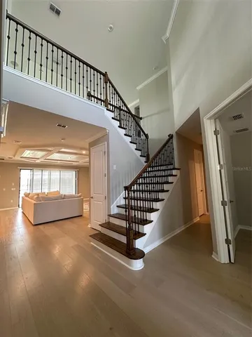 a view of an empty room and closet area