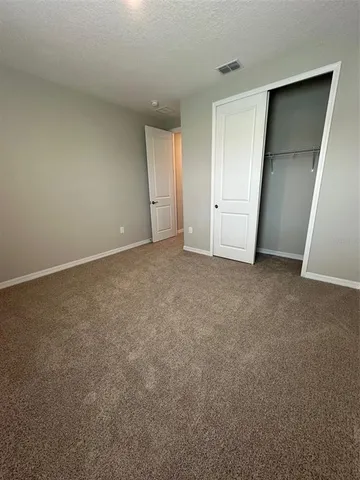 a view of swimming pool with seating space