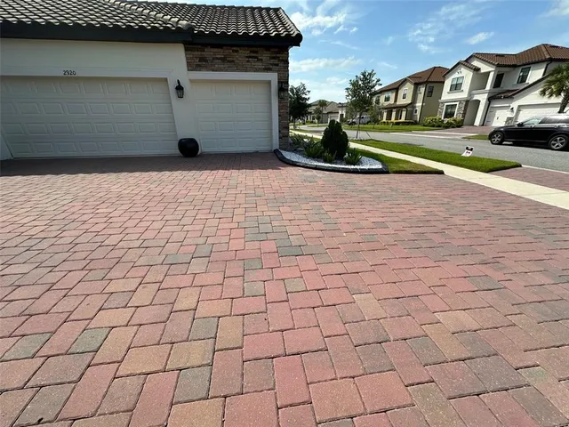 a view of a backyard of the house
