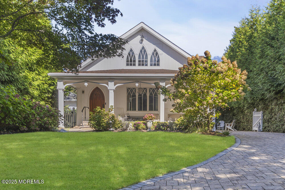 412 Brighton Avenue Spring Lake, NJ 07762 - Photo 1 of 56 front view of house with a yard