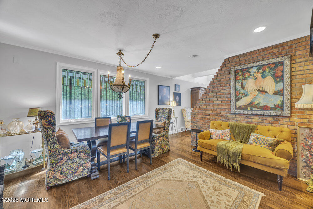 412 Brighton Avenue Spring Lake, NJ 07762 - Photo 11 of 56 a living room with furniture and wooden floor