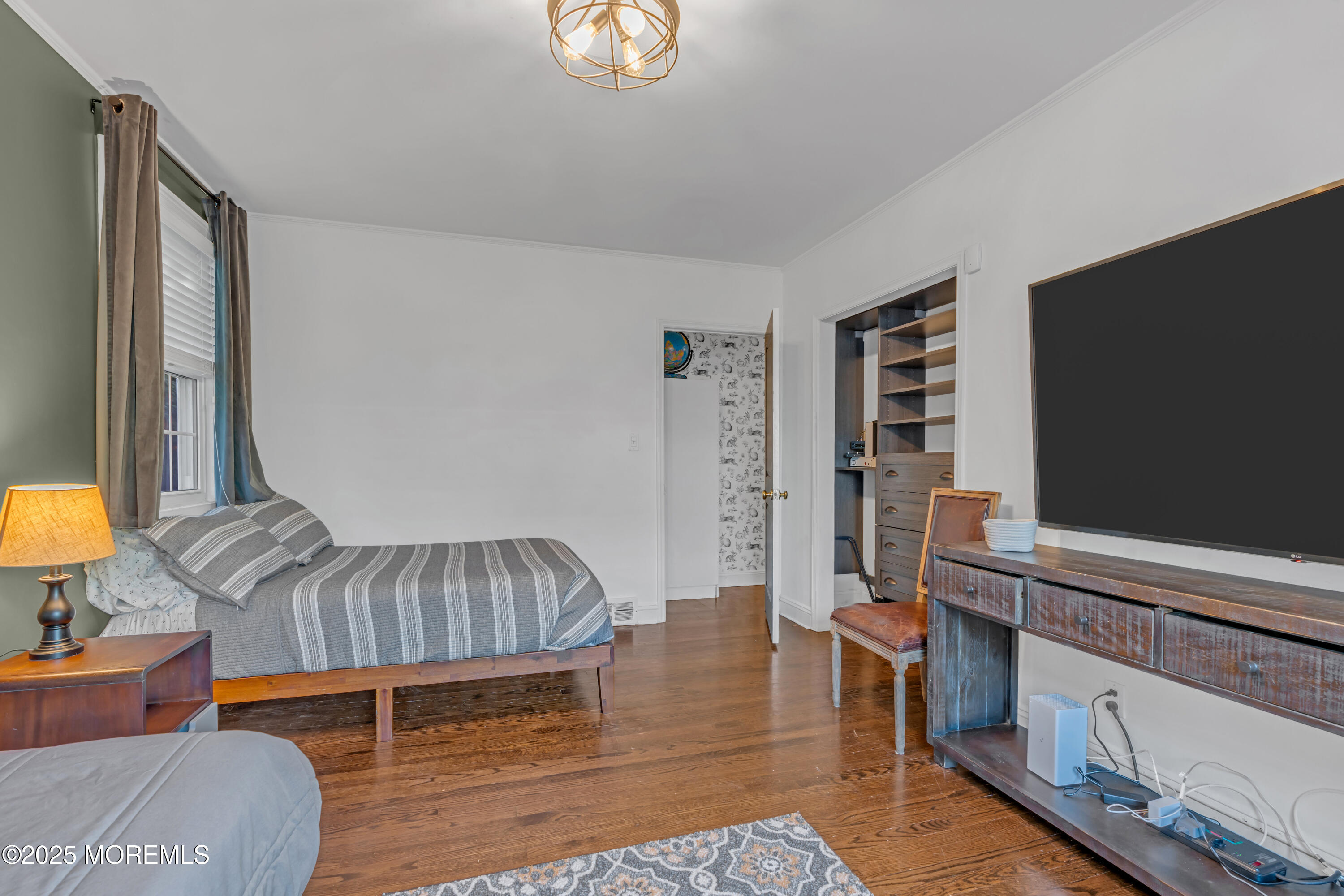 412 Brighton Avenue Spring Lake, NJ 07762 - Photo 18 of 56 a bedroom with furniture and a window