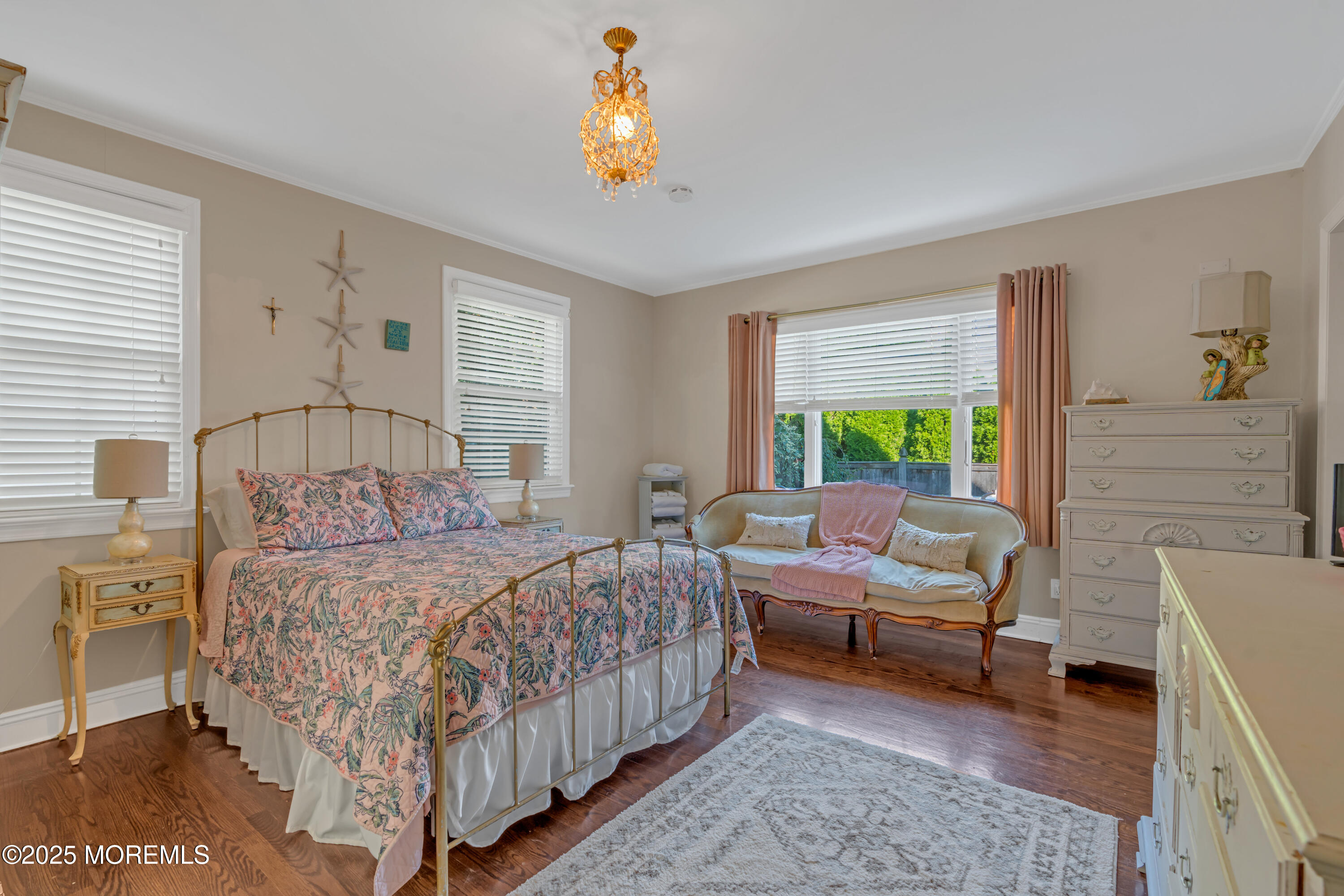 412 Brighton Avenue Spring Lake, NJ 07762 - Photo 19 of 56 a bedroom with a bed couch and a window