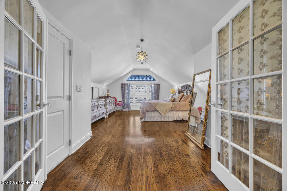 412 Brighton Avenue Spring Lake, NJ 07762 - Photo 34 of 56 a living room with furniture and a wooden floor