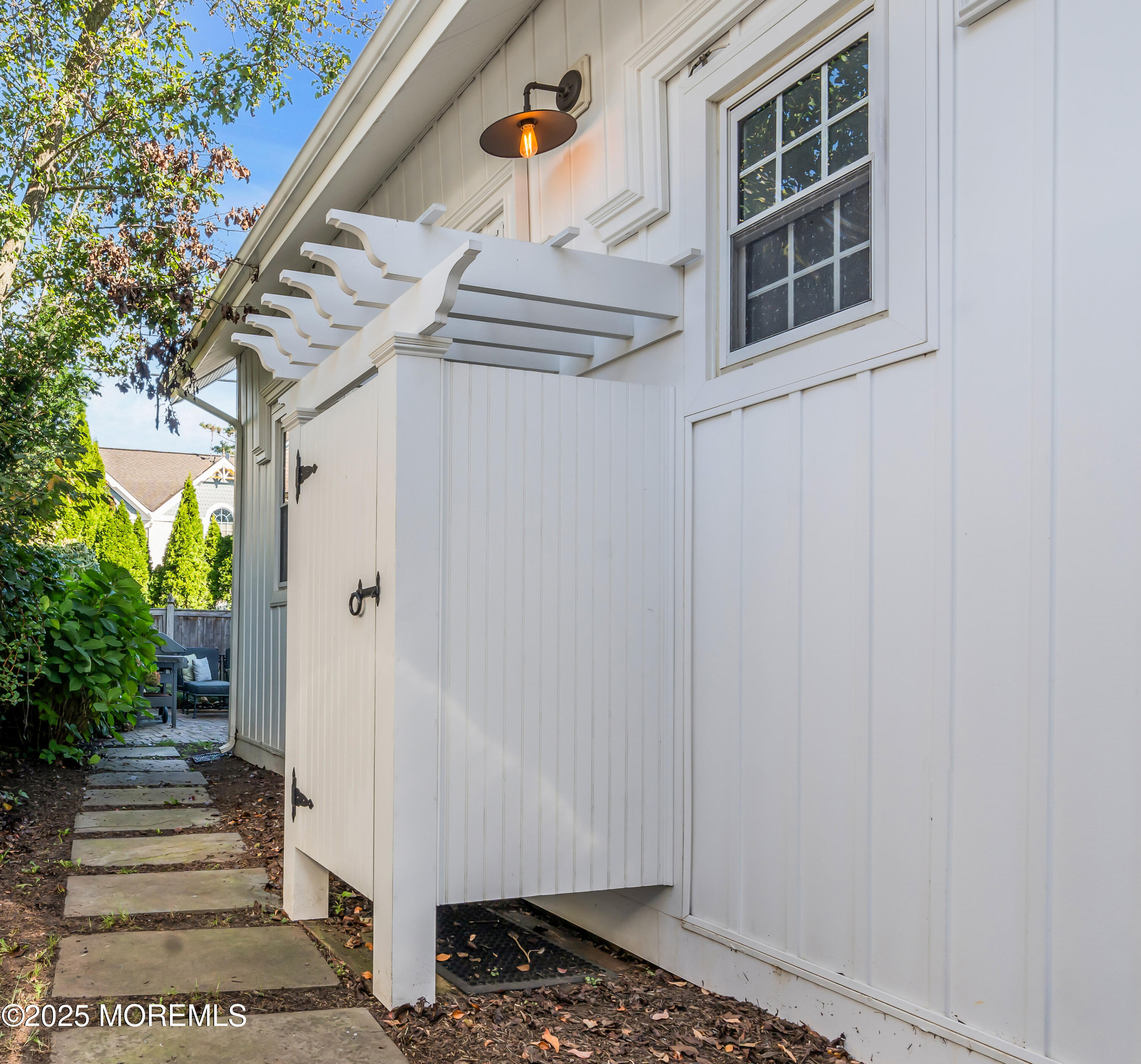 412 Brighton Avenue Spring Lake, NJ 07762 - Photo 46 of 56 a front view of a house with a yard