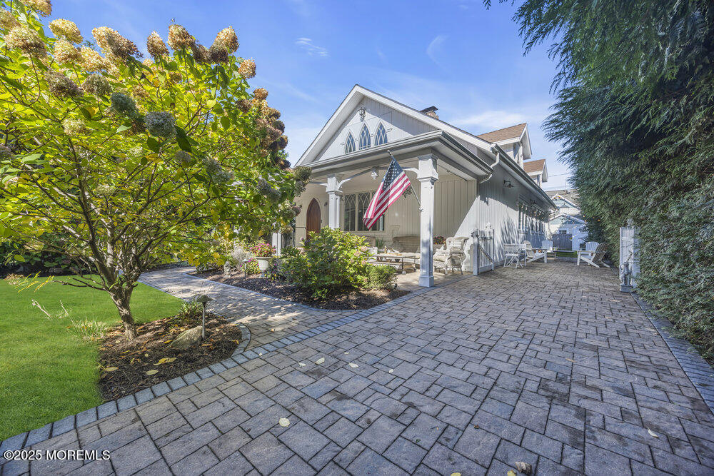 412 Brighton Avenue Spring Lake, NJ 07762 - Photo 52 of 56 a view of a house with a yard