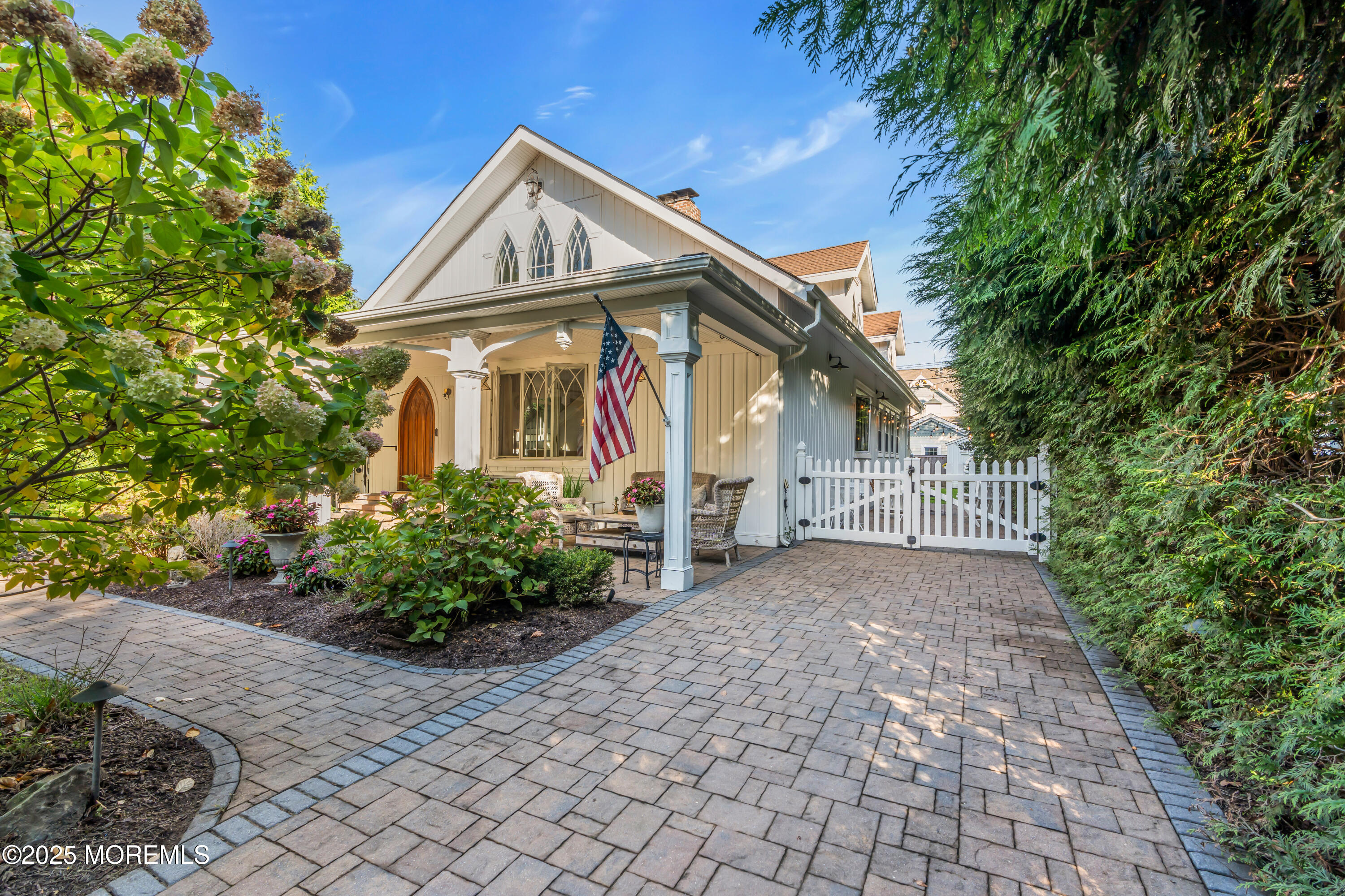 412 Brighton Avenue Spring Lake, NJ 07762 - Photo 53 of 56 a view of a house with a yard and potted plants