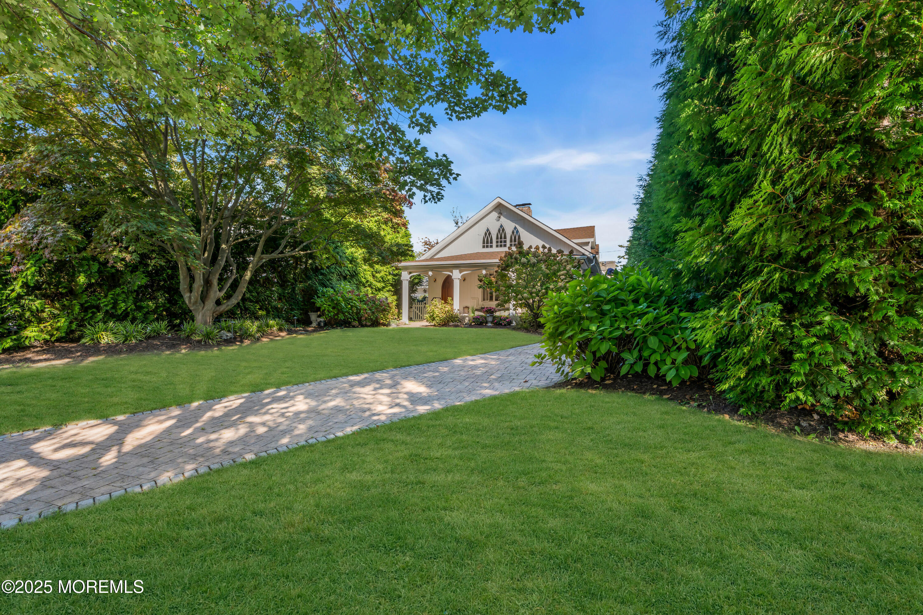 412 Brighton Avenue Spring Lake, NJ 07762 - Photo 56 of 56 a view of yard with swimming pool and green space