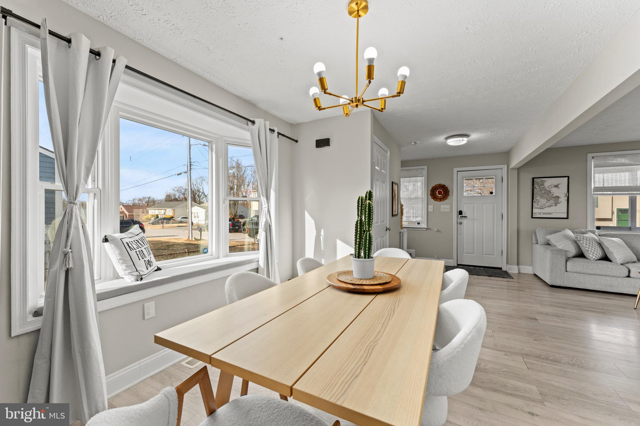 28 Queen Anne Road Glen Burnie, MD 21060 - Photo 13 of 47 a bedroom with furniture and a large window