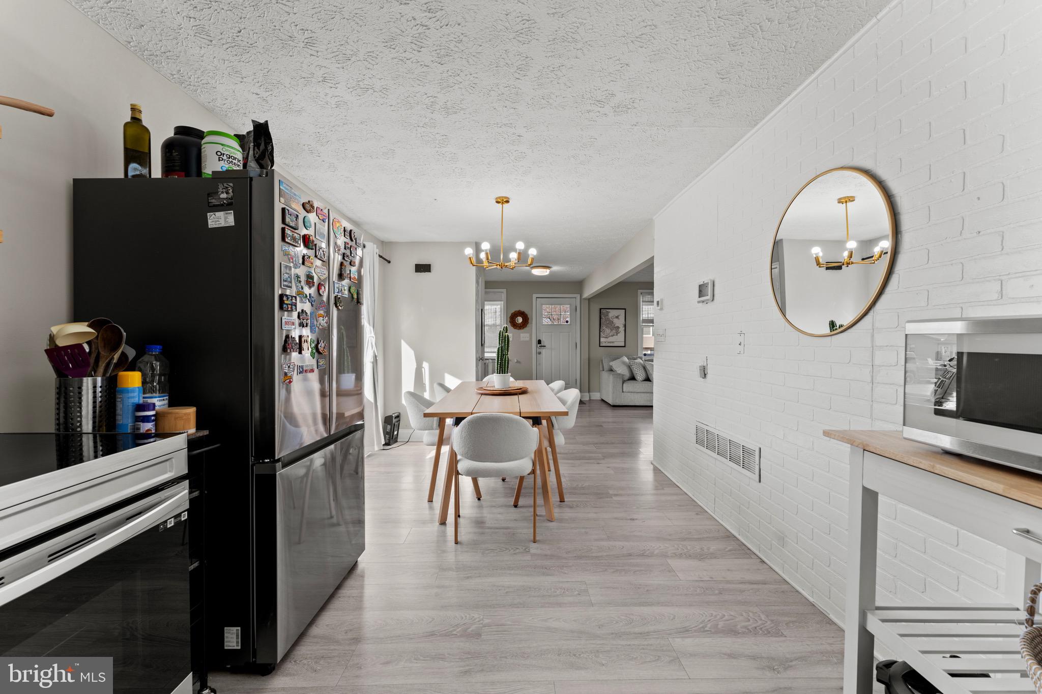 28 Queen Anne Road Glen Burnie, MD 21060 - Photo 21 of 47 a view of a dining room with furniture and wooden floor