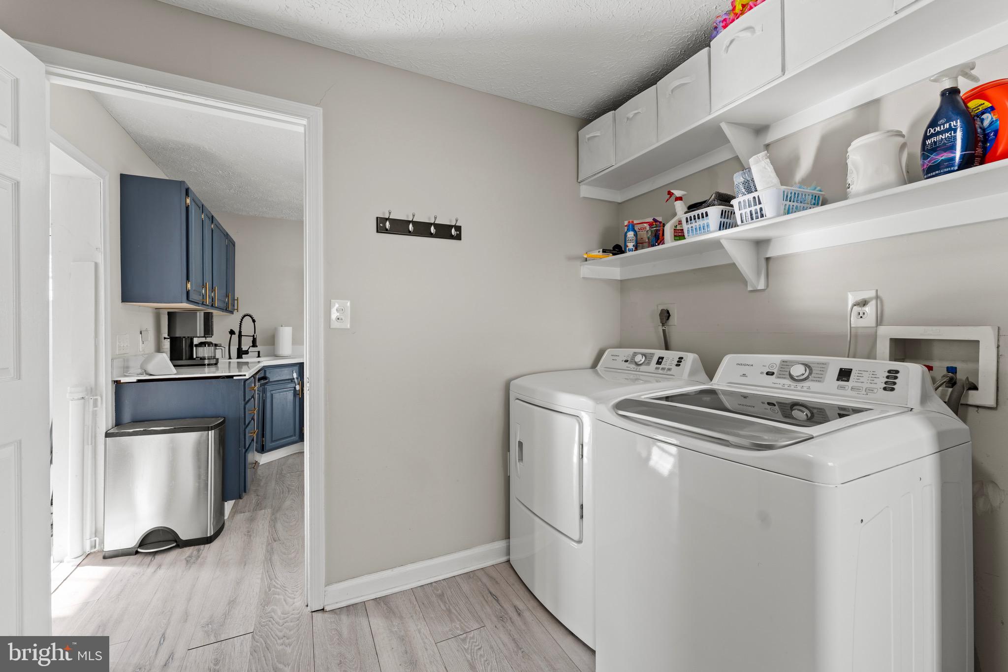 28 Queen Anne Road Glen Burnie, MD 21060 - Photo 26 of 47 a view of storage and utility room with washer and dryer