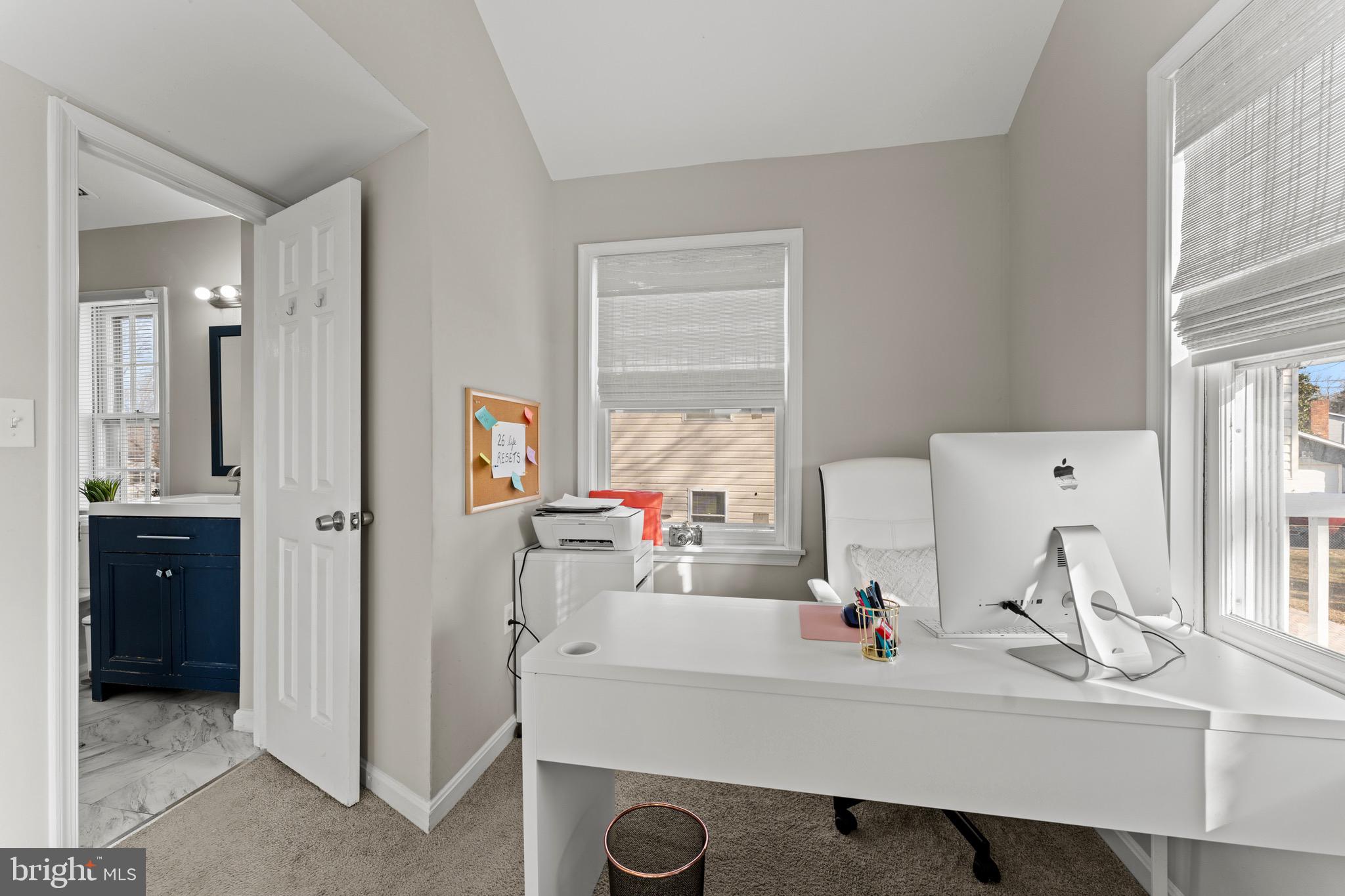 28 Queen Anne Road Glen Burnie, MD 21060 - Photo 40 of 47 a room with a sink and a mirror