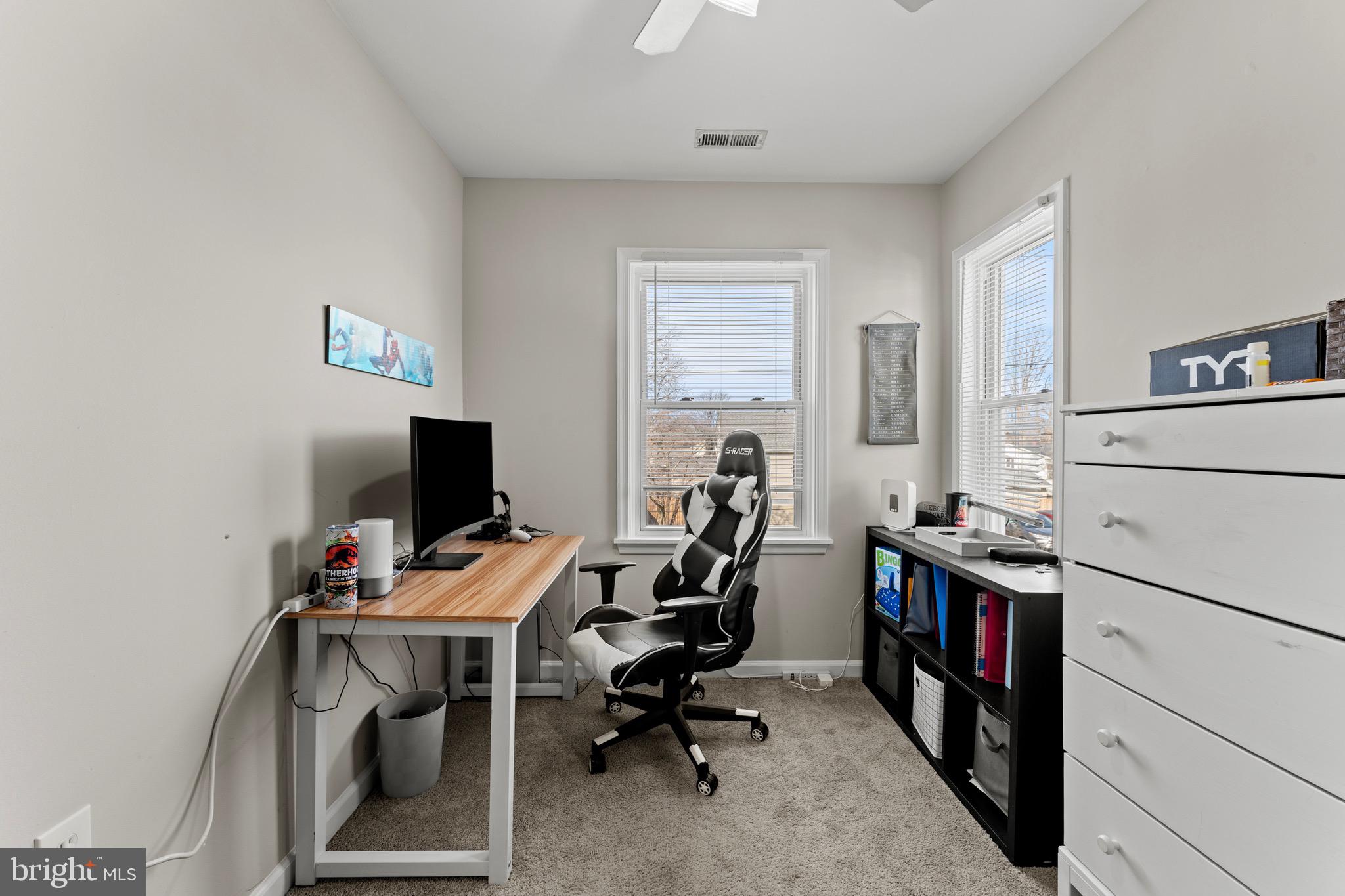 28 Queen Anne Road Glen Burnie, MD 21060 - Photo 43 of 47 a view of a workspace with furniture and a window