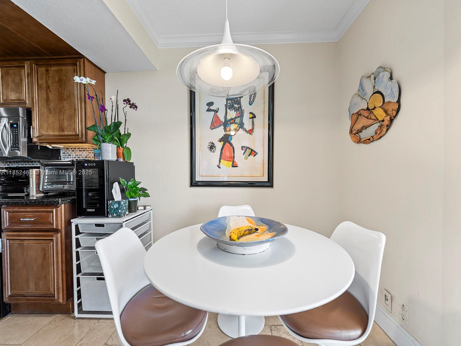 1000 Quayside Terrace, Unit 706 Miami, FL 33138 - Photo 11 of 33 a living room with furniture and a table