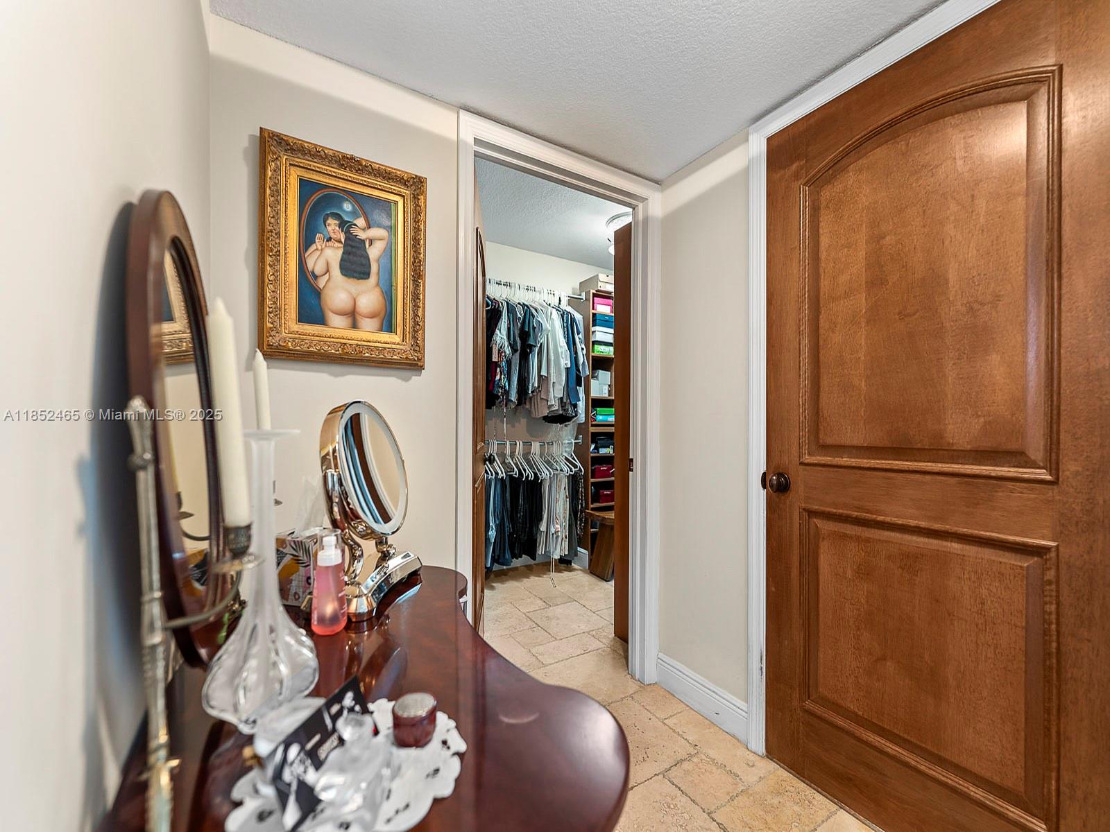 1000 Quayside Terrace, Unit 706 Miami, FL 33138 - Photo 15 of 33 a view of a livingroom with furniture and closet